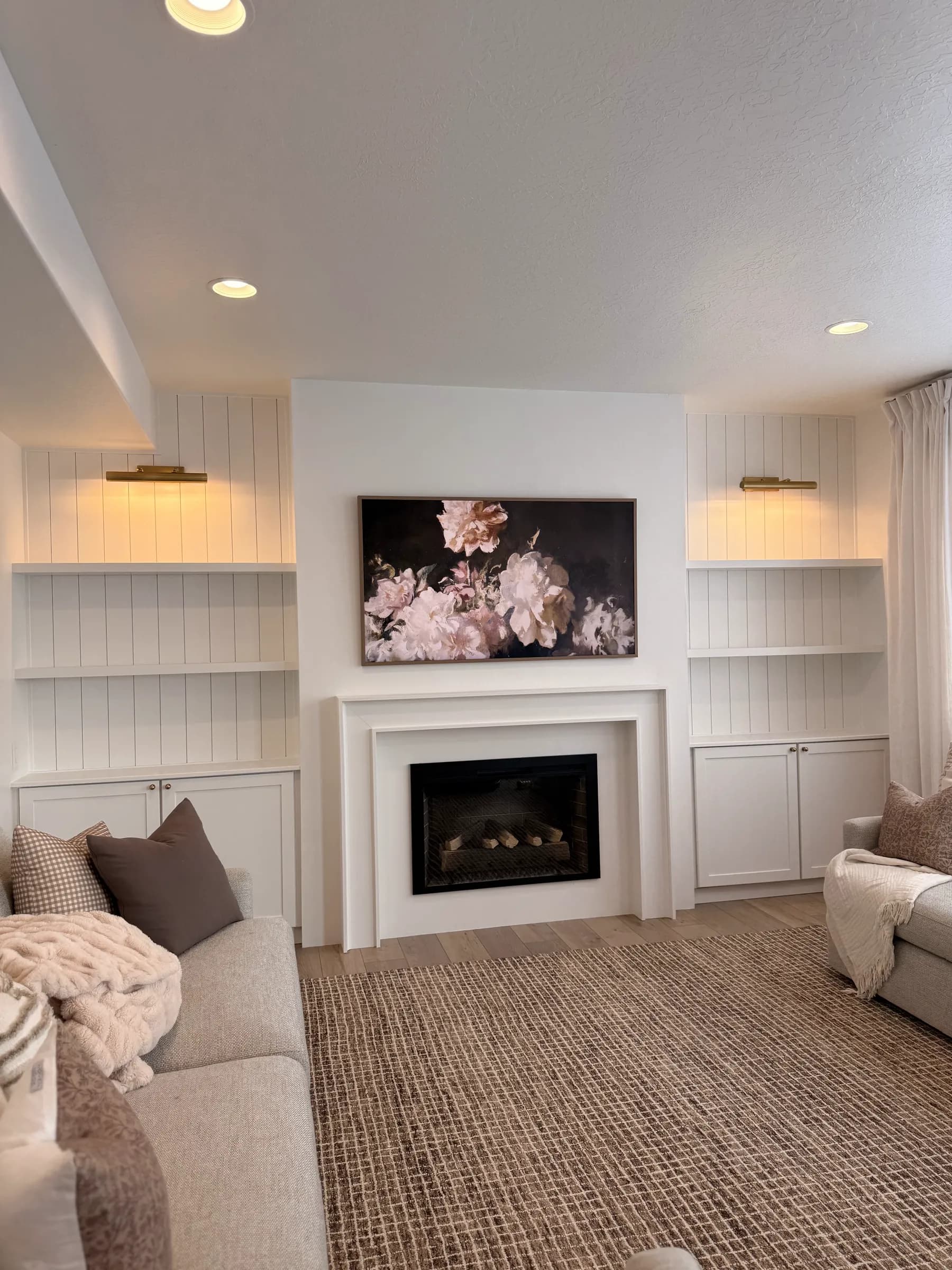 Fireplace with shiplap built-in shelving and styled decor by BK Toolbox