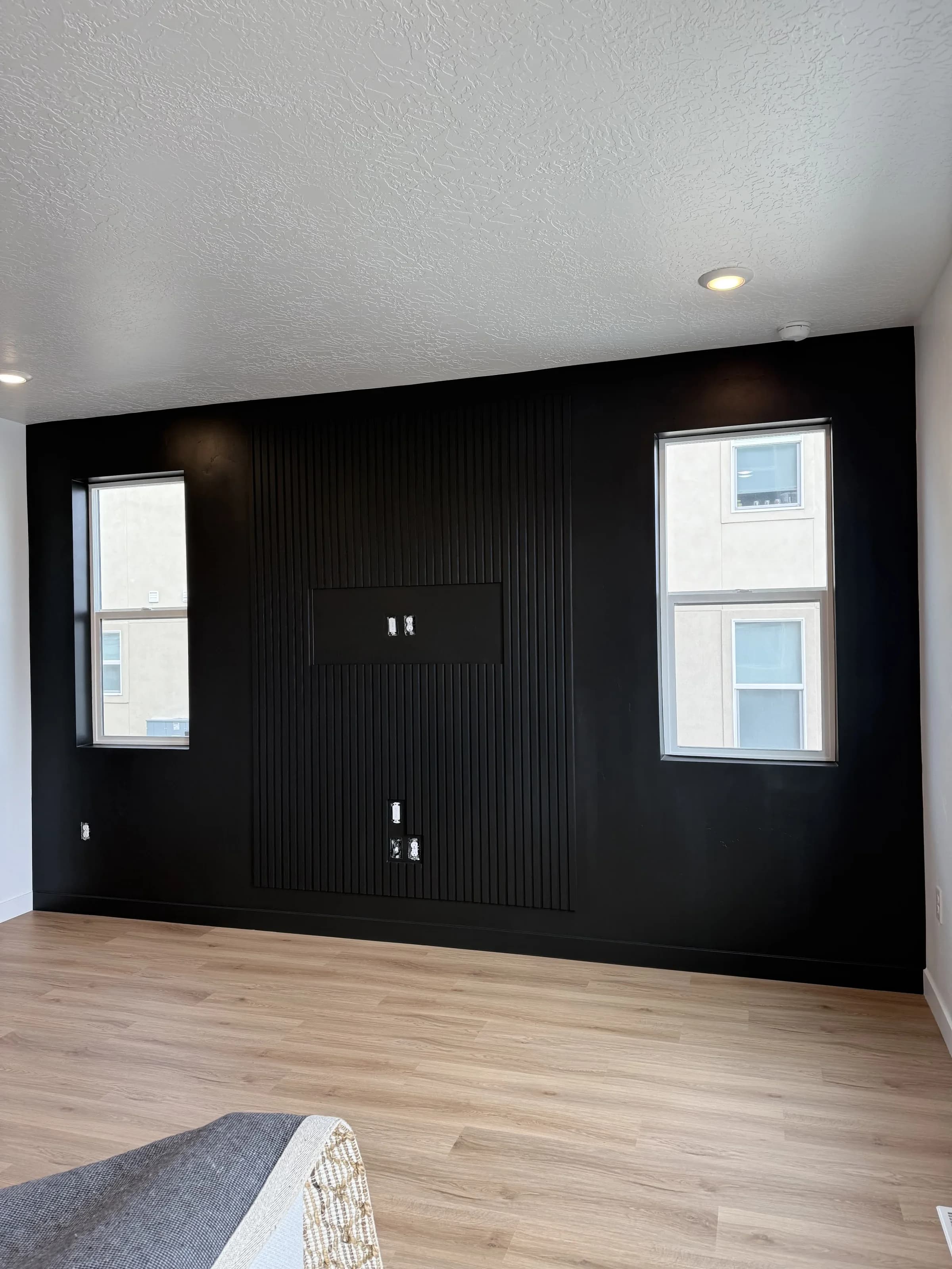 Bold black fluted feature wall by BK Toolbox