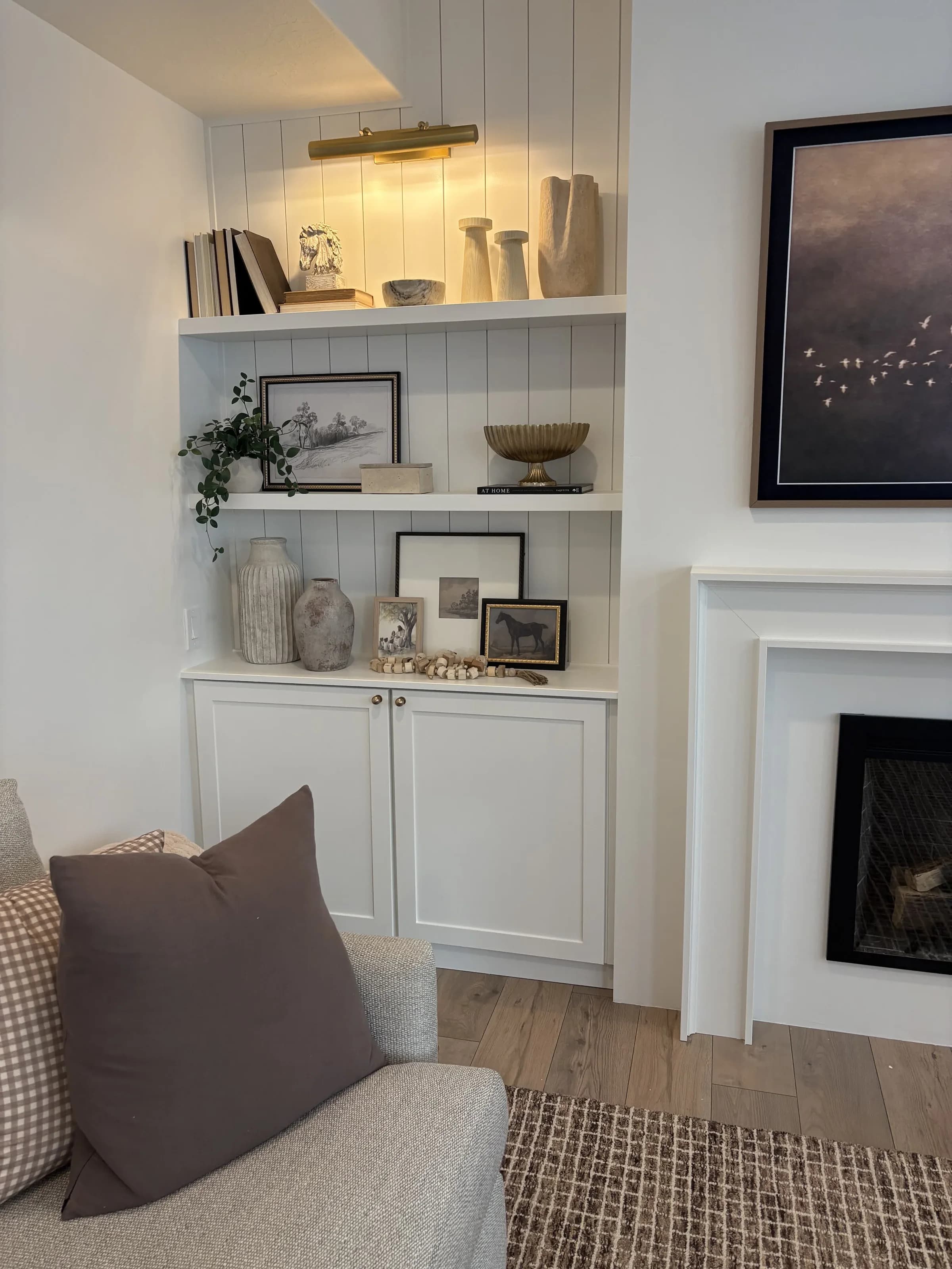 Built-in shelf nook beside the fireplace by BK Toolbox