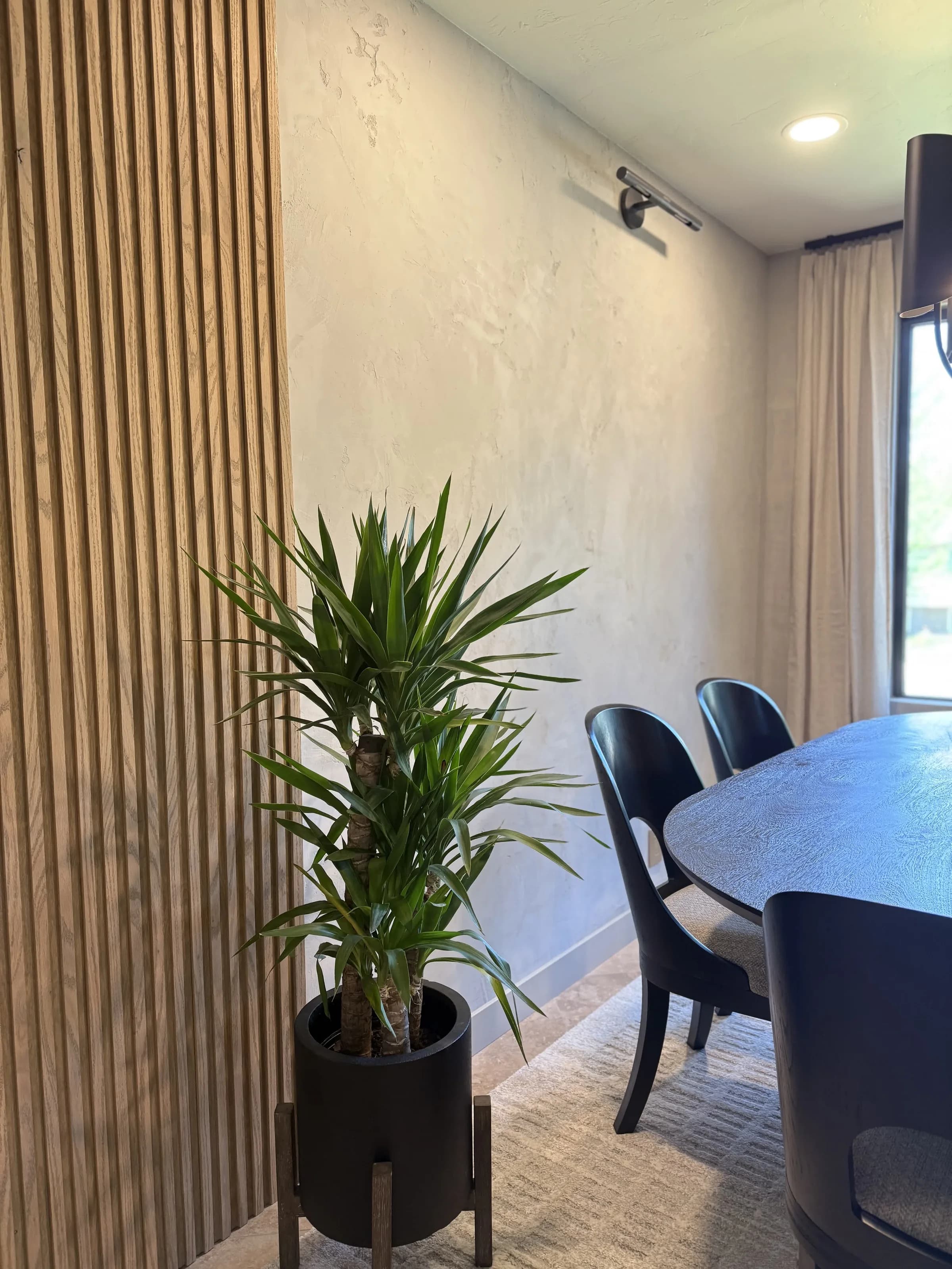 Dining nook with bench seating and gallery wall by BK Toolbox